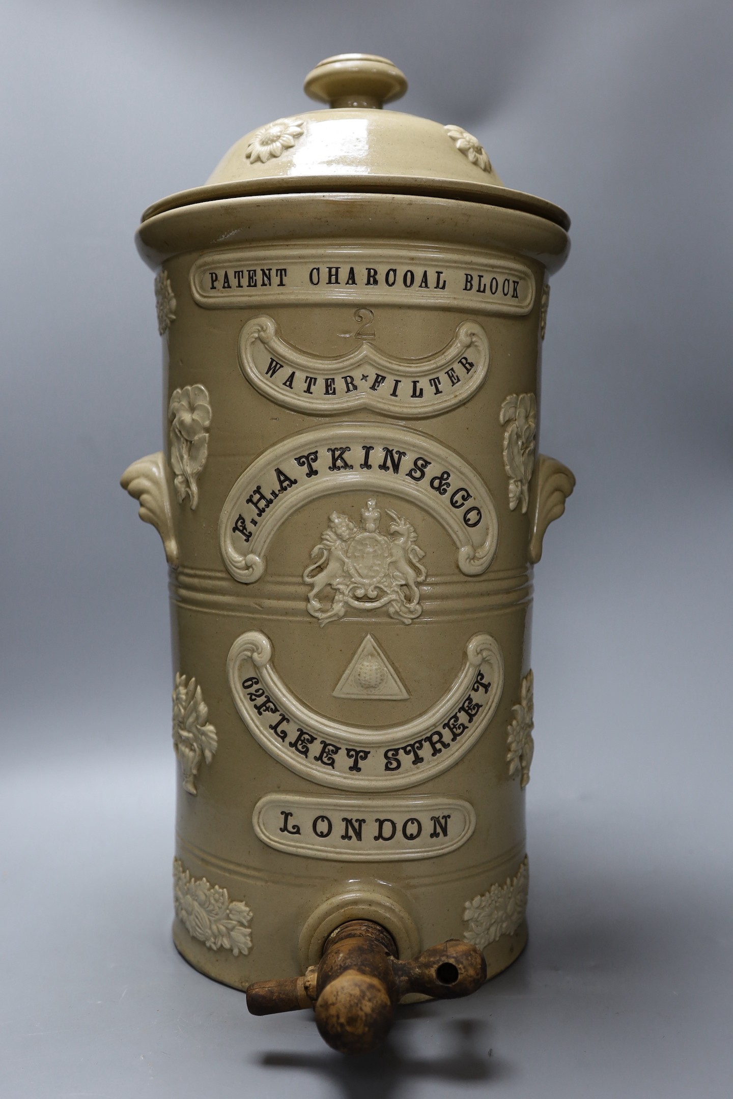 A 19th century stoneware water filter, Hatkins & Co. 50cm tall